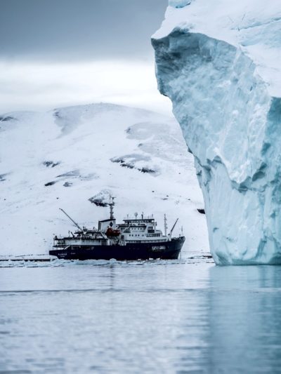 Boat near Iceberg -  Hubert Neufeld